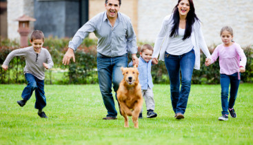Family running with dog Family running with dog